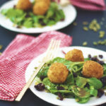 This fried goat cheese salad is the tastiest side salad ever! It features deep fried goat cheese balls, pepitas and cranberries with a simple vinaigrette.