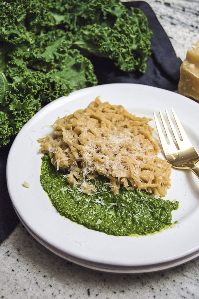 Kale pesto is the perfect sauce to pair with my sweet potato spaetzle. This easy side dish will be your new favorite fall meal!